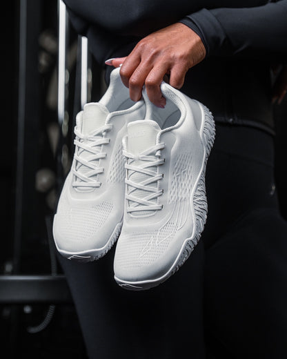 Apex Power V3 Crisp White — athlete holding shoes